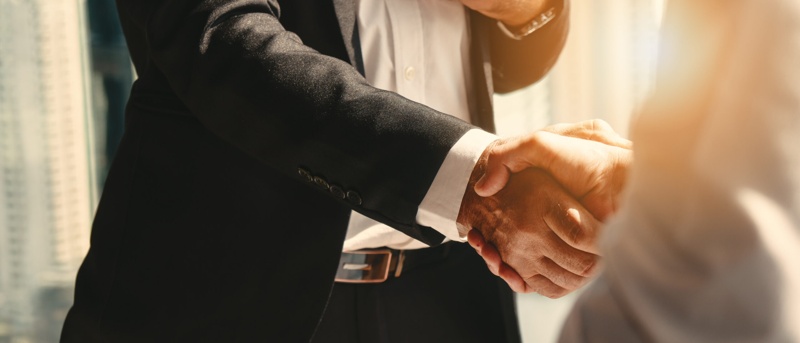 business background of businessman having handshake